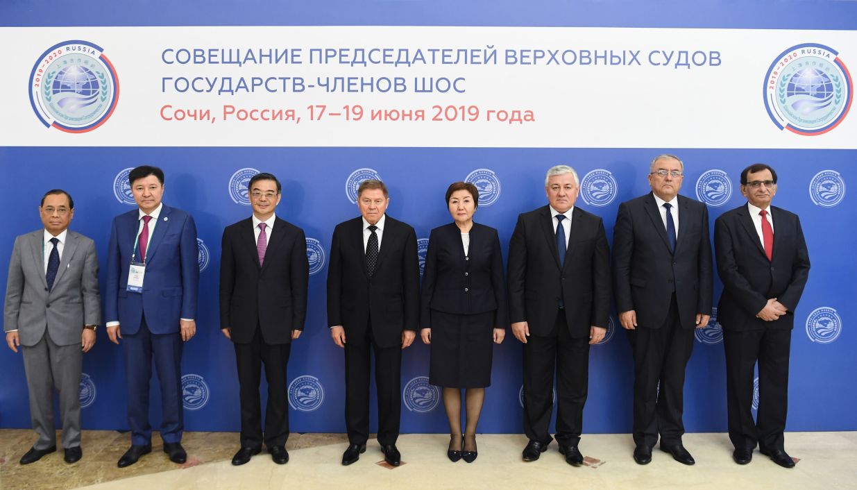 The 14th Meeting of Supreme Court Chief Justices of the Shanghai Cooperation Organisation (SCO) Member States during a joint photo session. From left: Chief Justice of the Supreme Court of India Ranjan Gogoi, Chief Justice of the Supreme Court of Kazakhstan Zhakip Asanov, Chief Justice and President of the Supreme People’s Court of China Zhou Qiang, Chief Justice of the Supreme Court of Russia Vyacheslav Lebedev, Chief Justice of the Supreme Court of Kyrgyzstan Gulbara Kaliyeva, Chief Justice of the Supreme Court of Tajikistan Shermuhammad Shokhiyon, Chief Justice of the Supreme Court of Uzbekistan Kozimjan Kamilov, Judge of the Supreme Court of Pakistan  Manzoor Ahmad Malik.