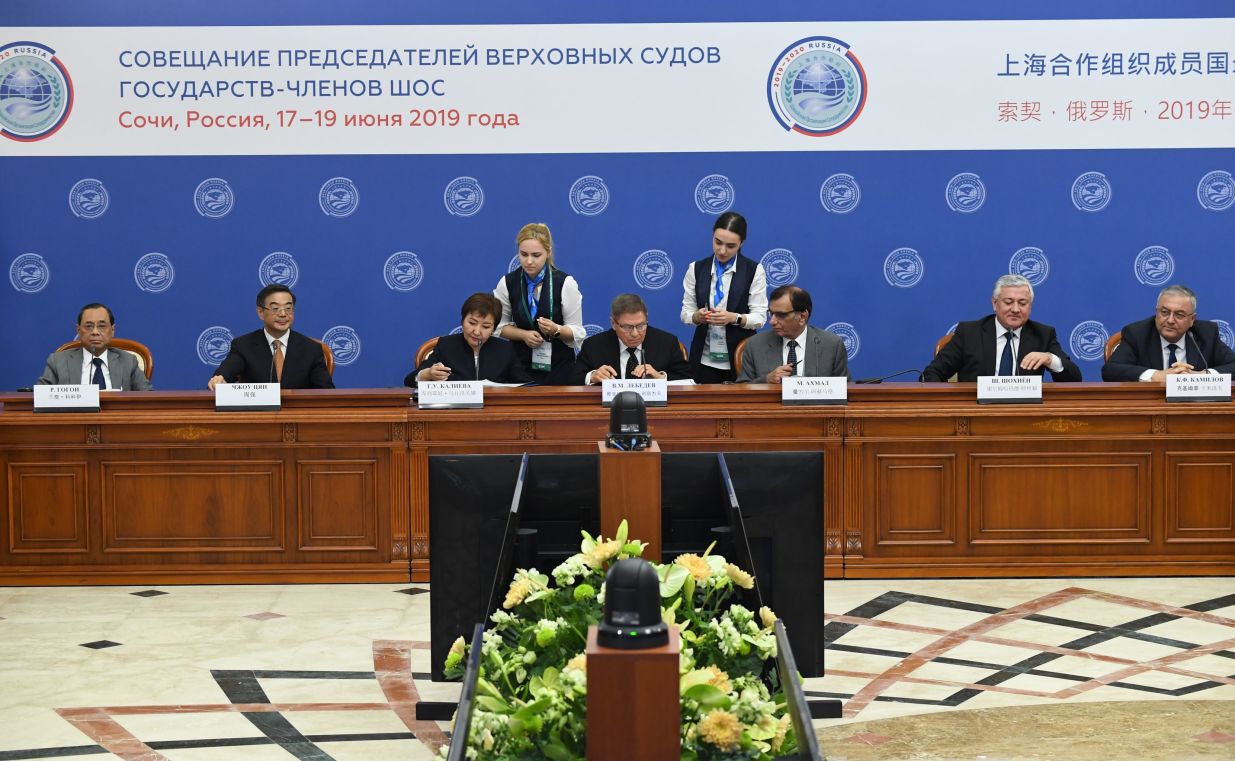 Participants in the 14th Meeting of Supreme Court Chief Justices of the Shanghai Cooperation Organisation (SCO) Member States during the signing of a joint statement following the meeting. From left: Chief Justice of the Supreme Court of India Ranjan Gogoi, Chief Justice and President of the Supreme People’s Court of China Zhou Qiang, Chief Justice of the Supreme Court of Kyrgyzstan Gulbara Kaliyeva, Chief Justice of the Supreme Court of Russia Vyacheslav Lebedev, Judge of the Supreme Court of Pakistan Manzoor Ahmad Malik, Chief Justice of the Supreme Court of Tajikistan Shermuhammad Shokhiyon and Chief Justice of the Supreme Court of Uzbekistan Kozimjan Kamilov.